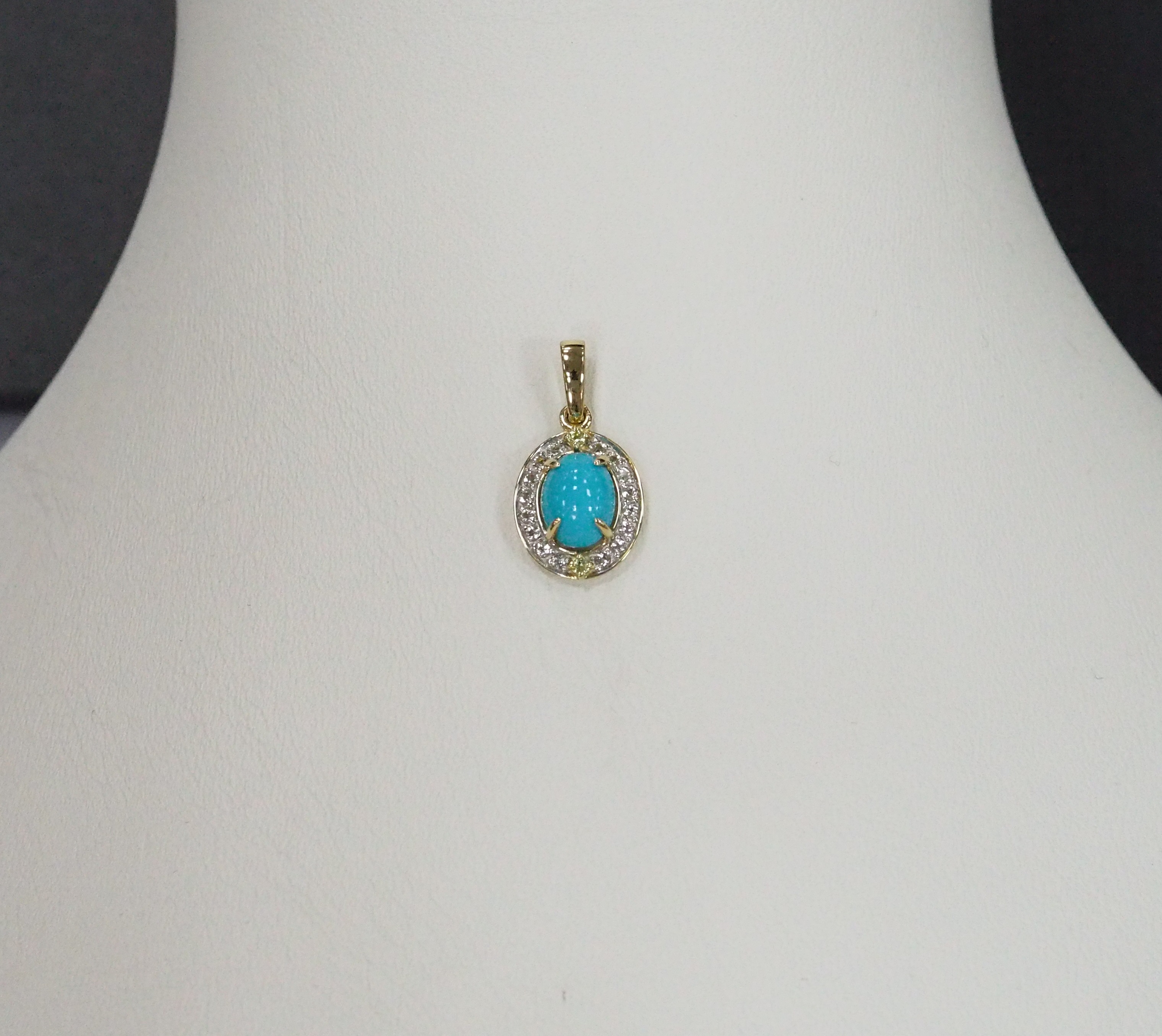 Подвеска из желтого золота с бирюзой